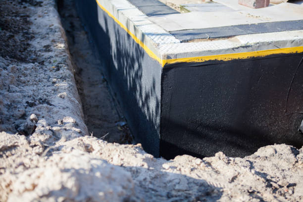 Professional Exterior Waterproofing technician working in Lewisville, NC